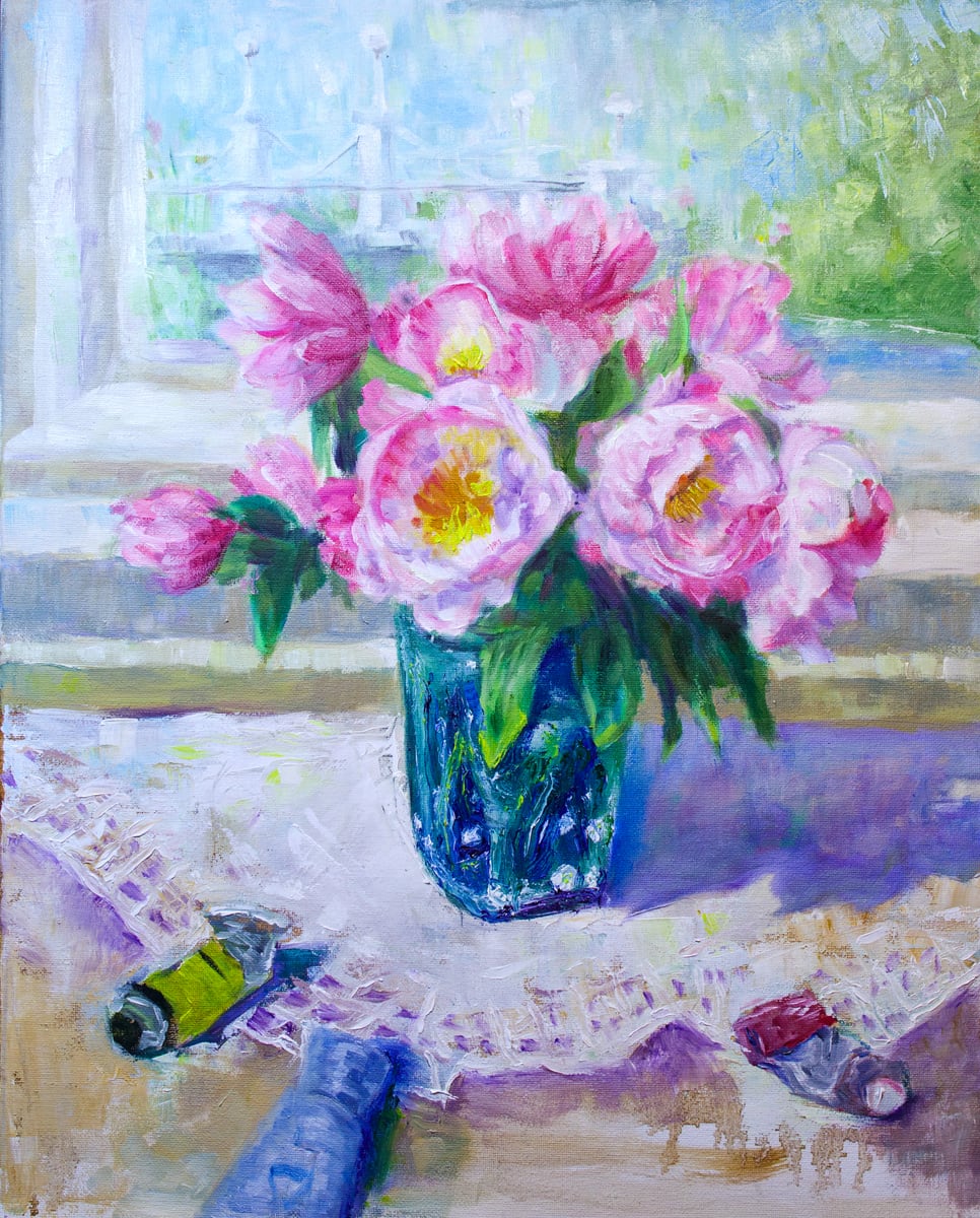Still life artwork of pink flowers in a blue vase near a window